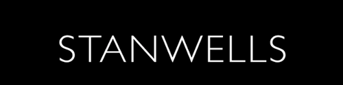 The word 'STANWELLS' appears in thin white uppercase letters centered on a solid black background.